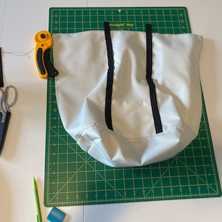 Front panel of Clare's Eleven Fifteen Daypack during assembly