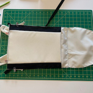 Inside back panel and laptop pocket of Clare's Eleven Fifteen during assembly