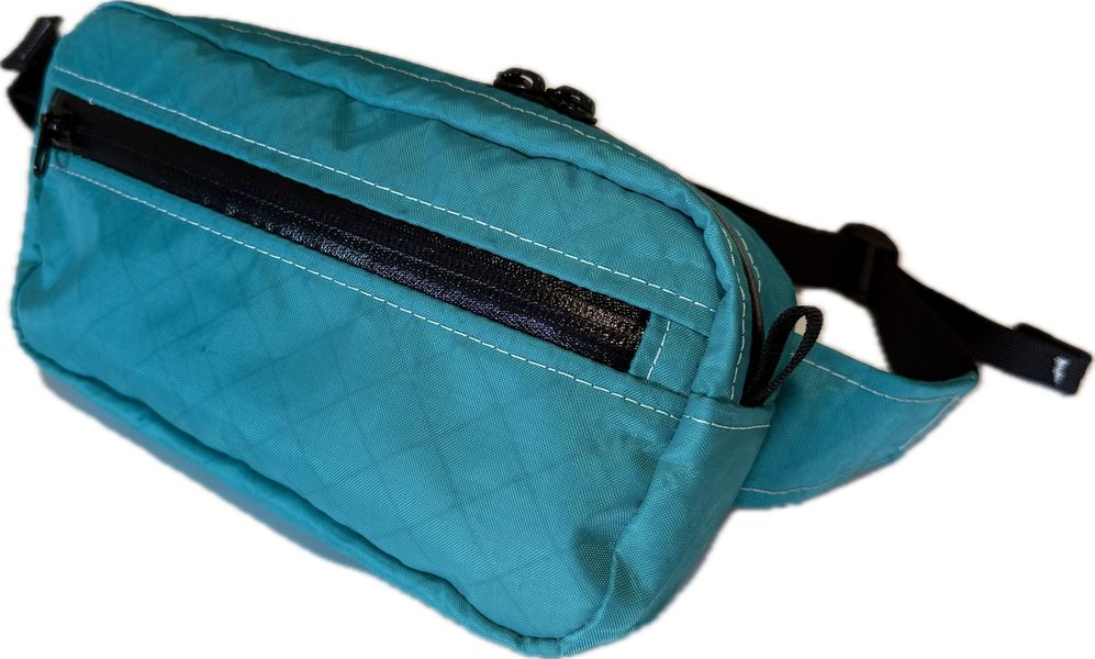 Front three quarter view of a teal Towpath Pack in ECOPAK 200